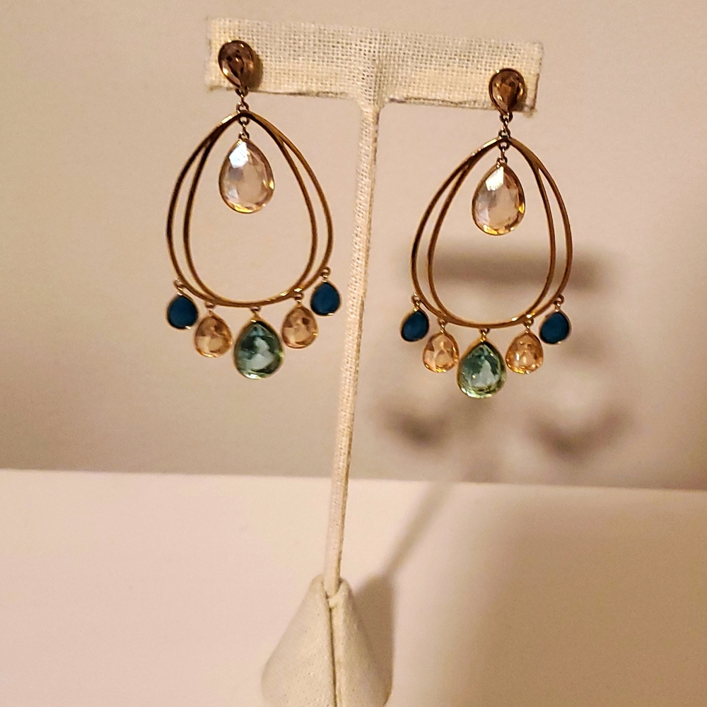 Swarovski gold earrings.